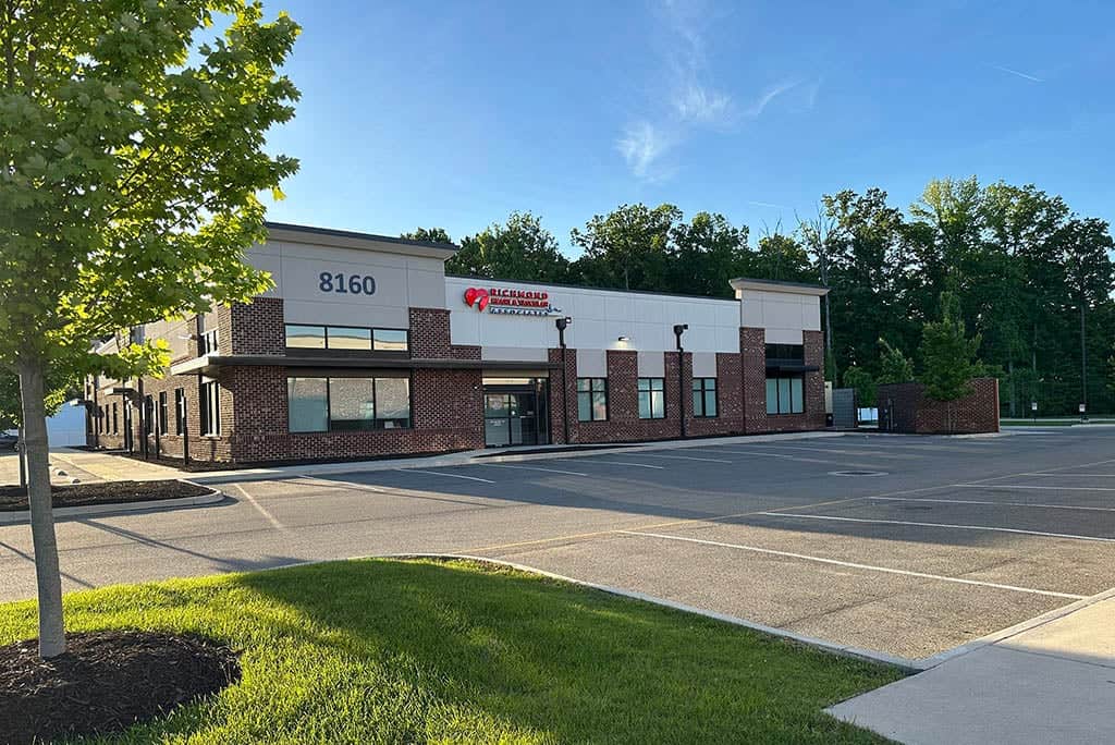 Exterior view of the medical office building and parking lot for Cardiology Care in Mechanicsville