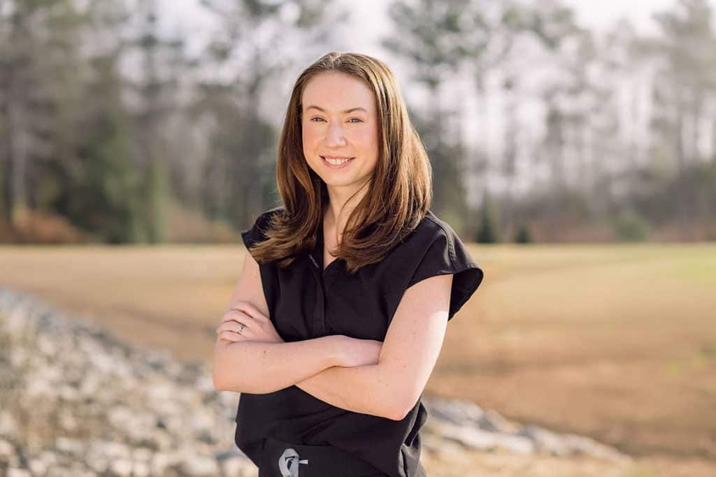 Nurse practitioner posing outdoors for a professional headshot for Taylor Armstrong Walker